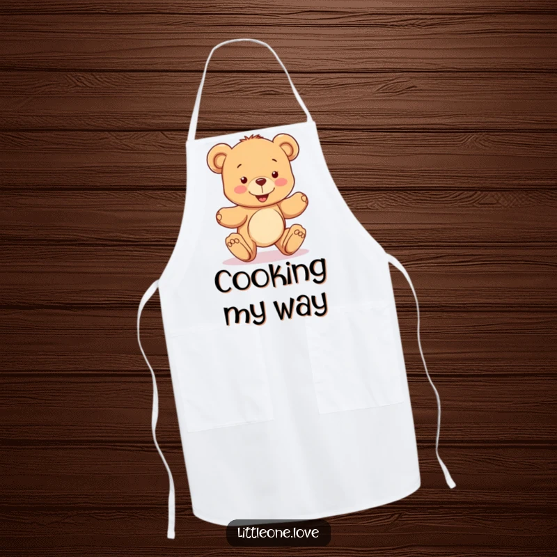 Funny apron with a happy teddy bear character learning to take wobbly steps, adding a touch of adorable encouragement and protection to kitchen activities, great gift.