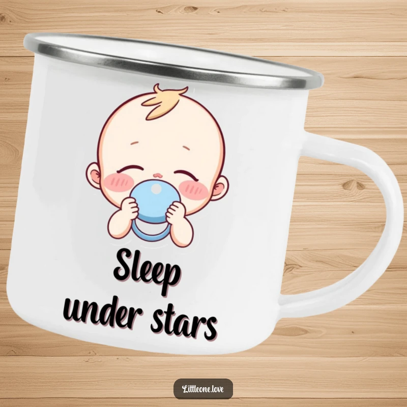 Funny sleepy baby with rosy cheeks holding a pacifier, on a durable enamel camping mug.