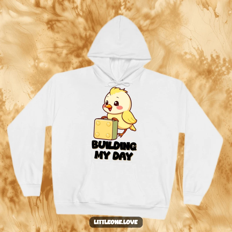 Funny hoodie featuring a cheerful baby bird character pecking at a colorful block, offering cozy comfort and adorable humor, ideal funny gift.