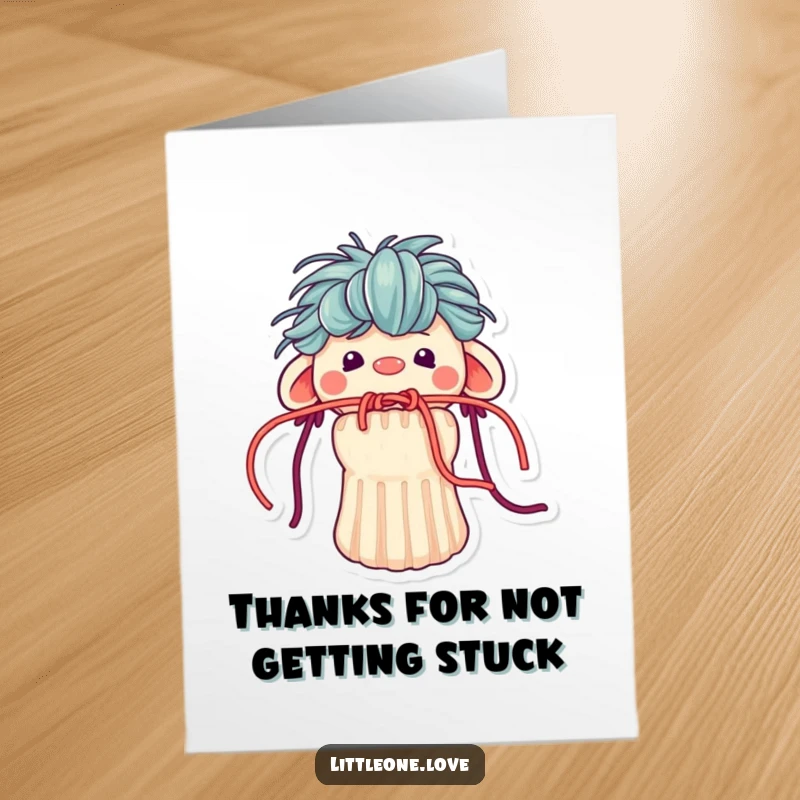 Funny Free Printable Thank You Card: Tiny sock puppet with yarn hair stuck in mouth, giving thanks with a tangled grin.